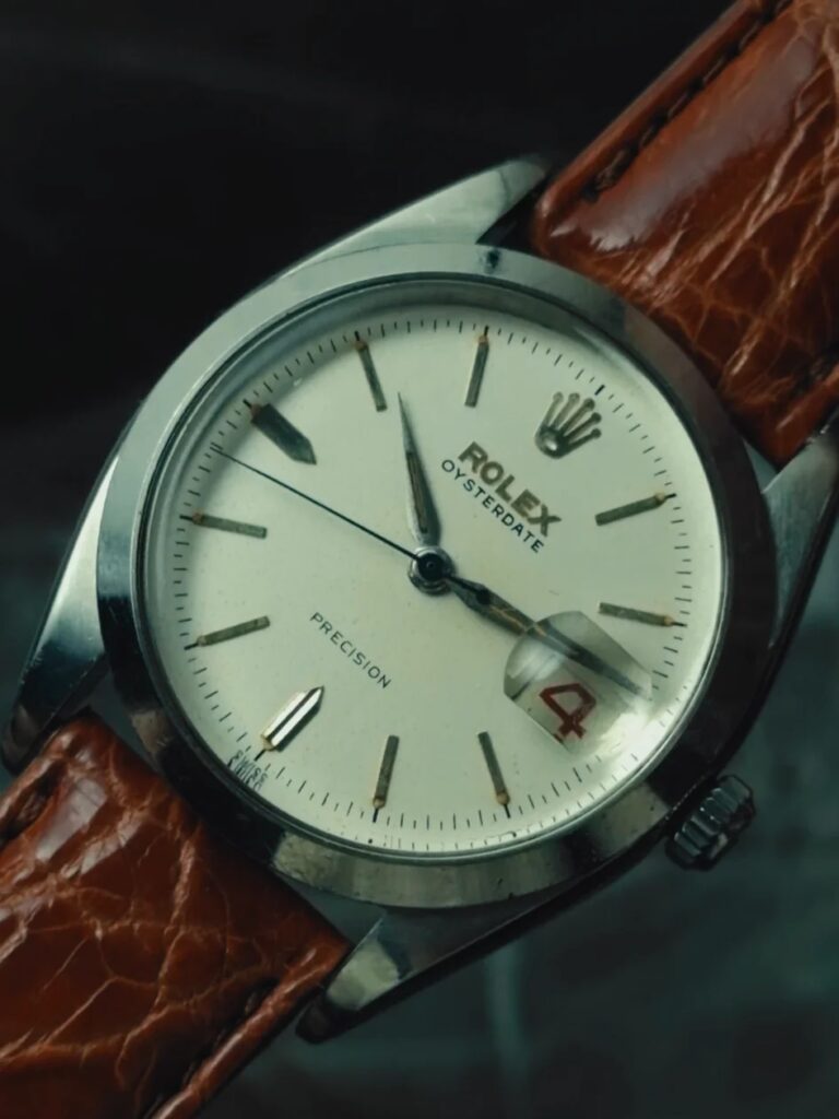 "1950年代の職人技が息づくブルースチール針。" ROLEX Oysterdate Precisionを販売開始。
